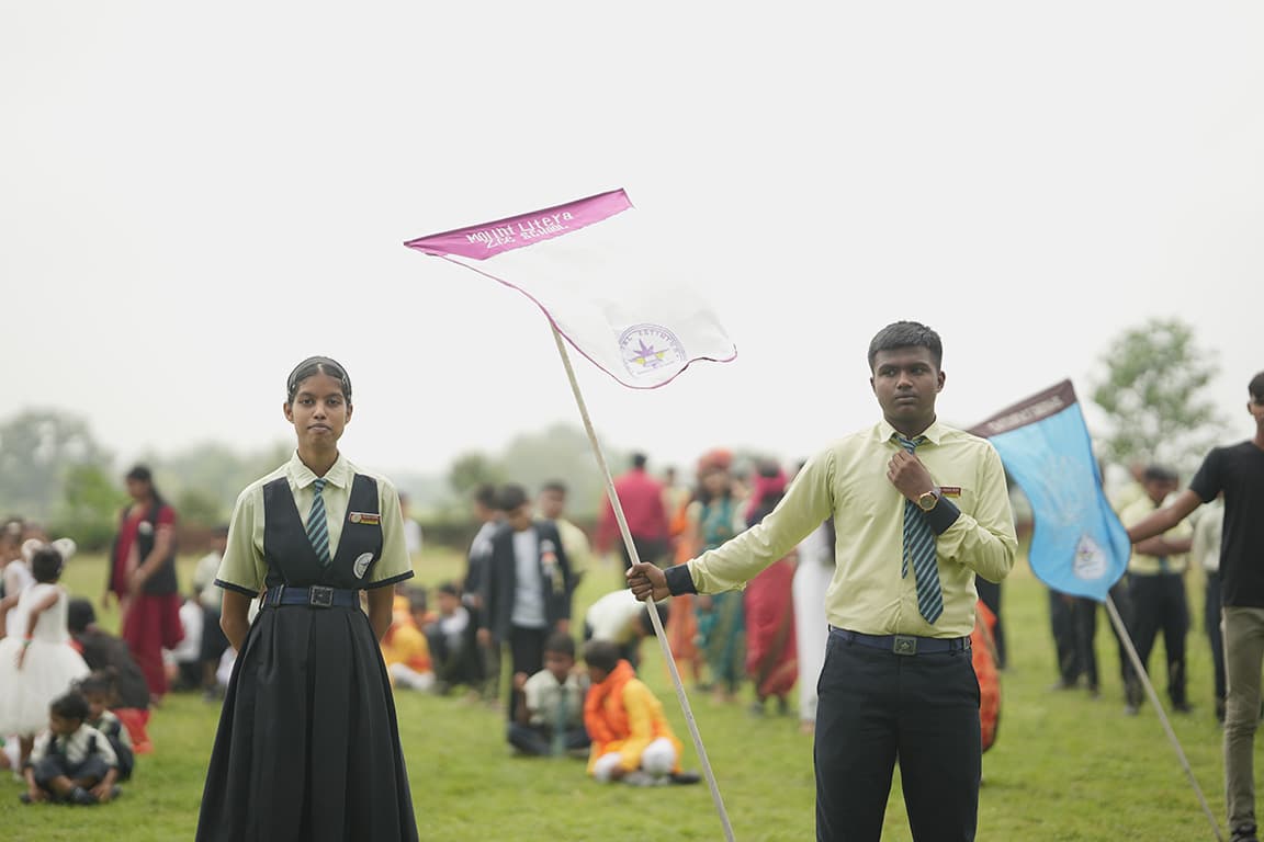 Cheerful students applauding on stage